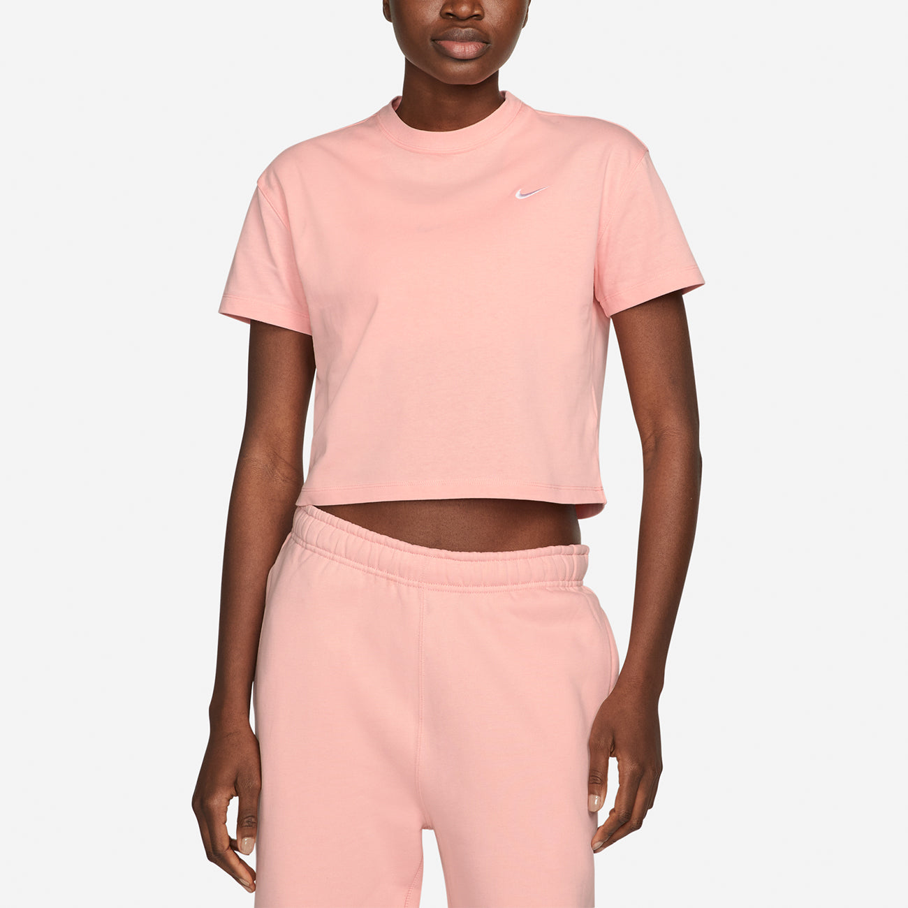 Women's NRG Soloswoosh SS Tee - Bleached Coral/White