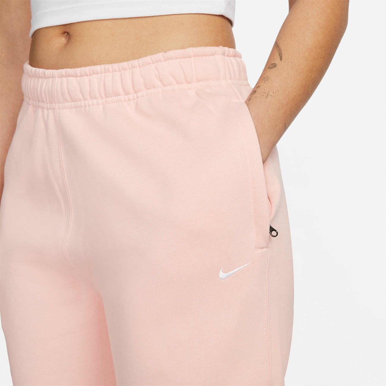 Women's Soloswoosh Fleece Pant - Bleached Coral/White